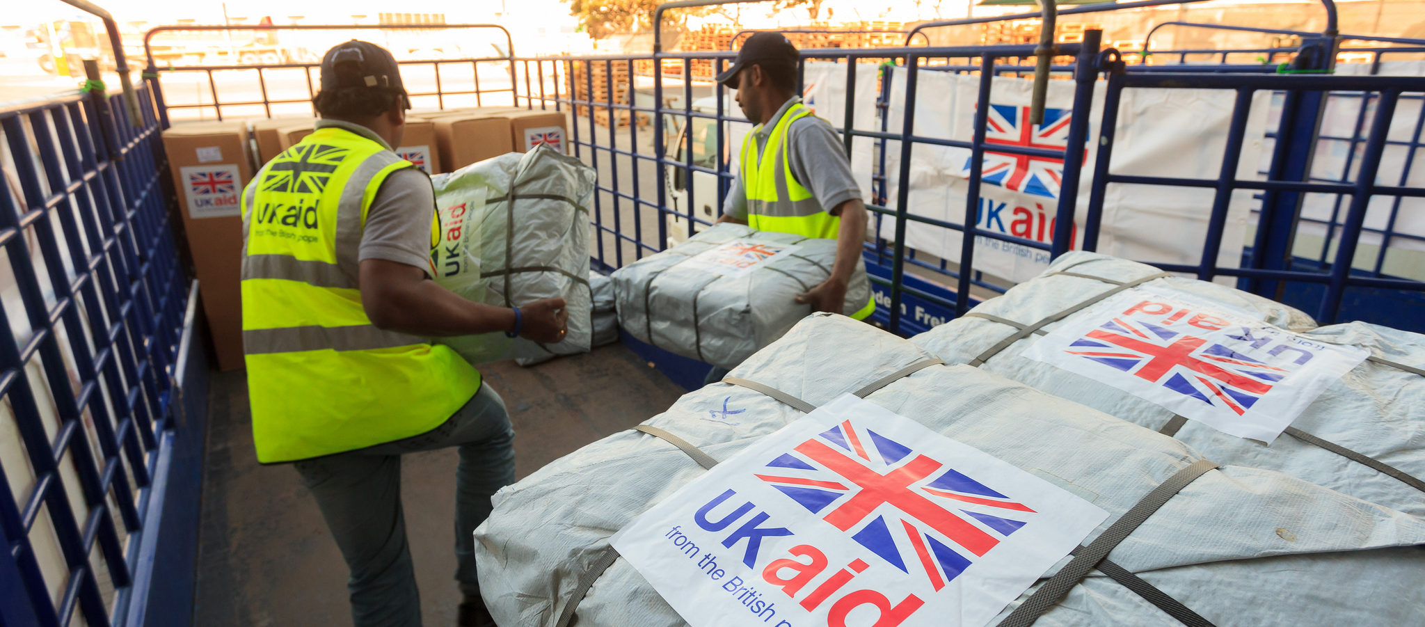 UK research's impact on international development. Photo cred - DFID, UK aid shelter kits are loaded for shipment in Dubai